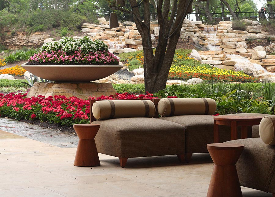 Cozy patio featuring a large flower pot and two inviting chairs for relaxation